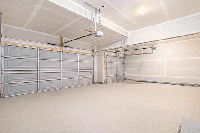 5227 Brinson Ln, Kalamazoo, MI 49009 - garage featuring a garage door opener