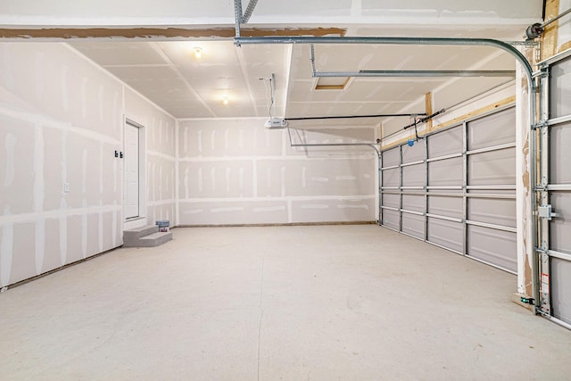 5227 Brinson Ln, Kalamazoo, MI 49009 - garage featuring a garage door opener