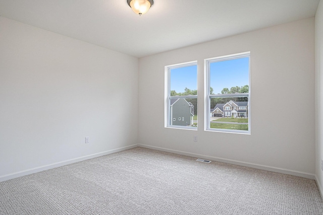 5227 Brinson Ln, Kalamazoo, MI 49009 - carpeted empty room with baseboards