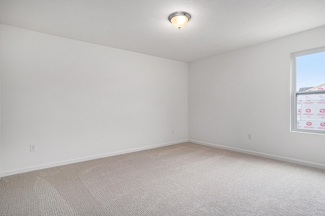 5227 Brinson Ln, Kalamazoo, MI 49009 - spare room with baseboards and carpet
