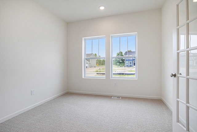 5227 Brinson Ln, Kalamazoo, MI 49009 - carpeted spare room featuring baseboards and recessed lighting