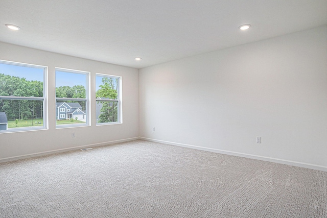 5227 Brinson Ln, Kalamazoo, MI 49009 - spare room with light carpet and recessed lighting