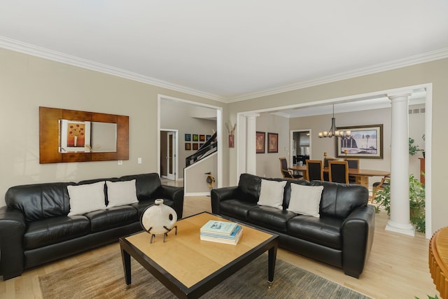 6264 Wildwood Ln, West Bloomfield, MI 48324 - living area featuring ornate columns, crown molding, light wood finished floors, and a chandelier