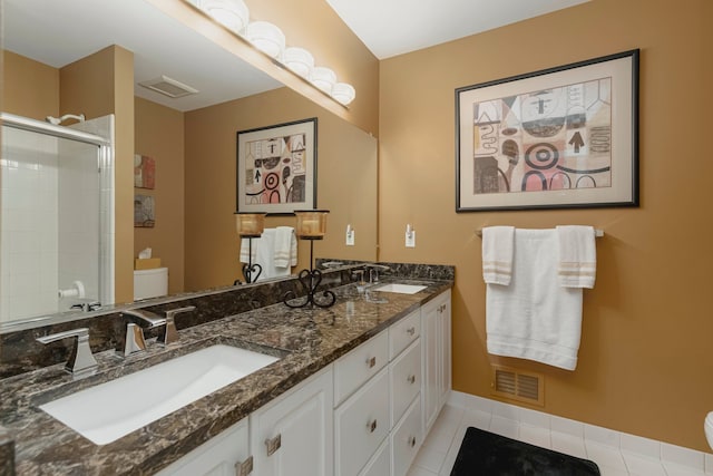 6264 Wildwood Ln, West Bloomfield, MI 48324 - full bath with toilet, a shower stall, tile patterned flooring, and double vanity