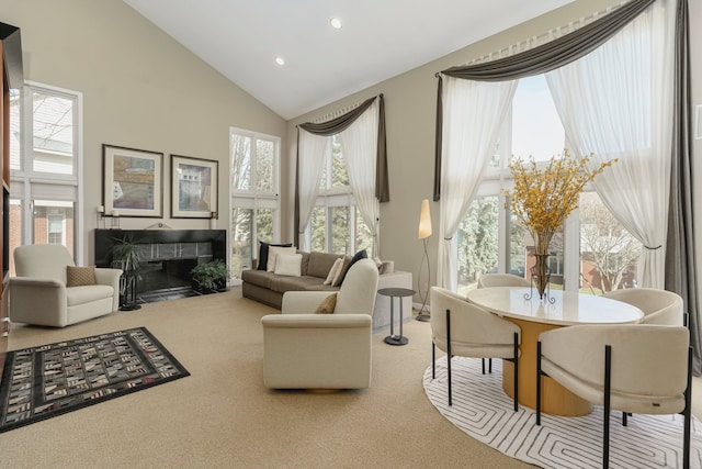 6264 Wildwood Ln, West Bloomfield, MI 48324 - sitting room featuring high vaulted ceiling, carpet floors, a tile fireplace, plenty of natural light, and recessed lighting
