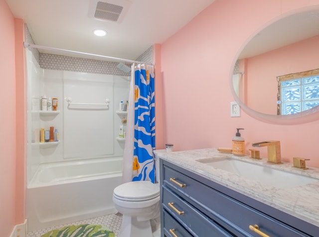 full bathroom with visible vents, toilet, shower / tub combo with curtain, tile patterned floors, and vanity