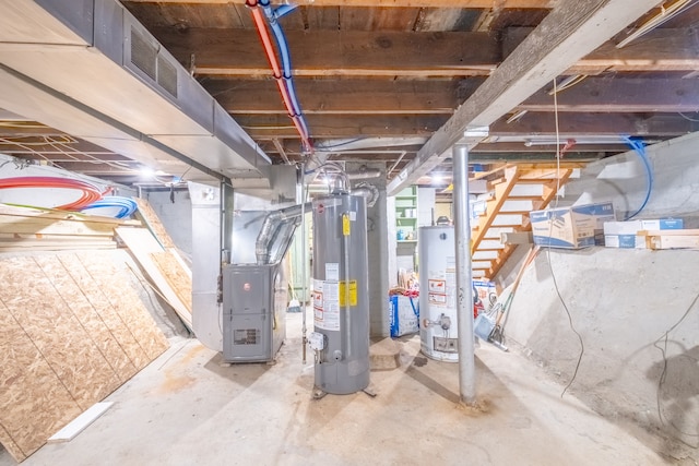 unfinished basement featuring stairway, heating unit, visible vents, and water heater