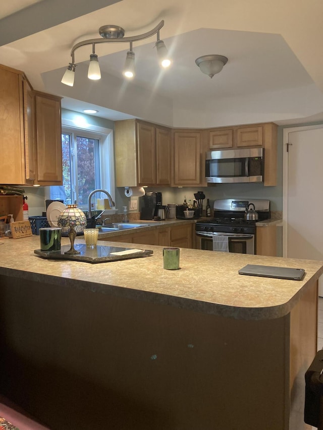 kitchen featuring a sink and stainless steel appliances