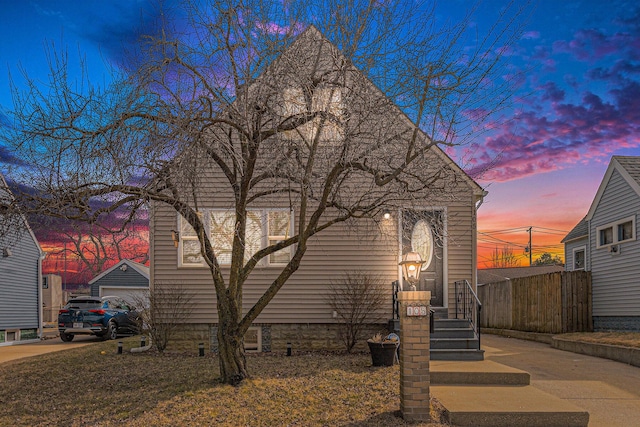 view of property exterior at dusk