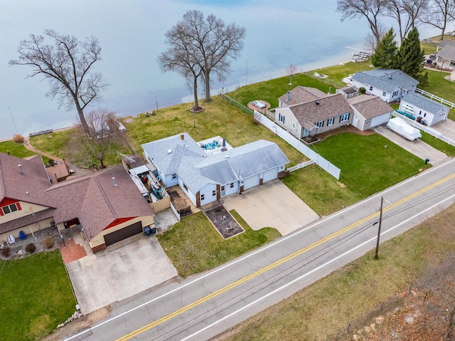 aerial view with a residential view and a water view