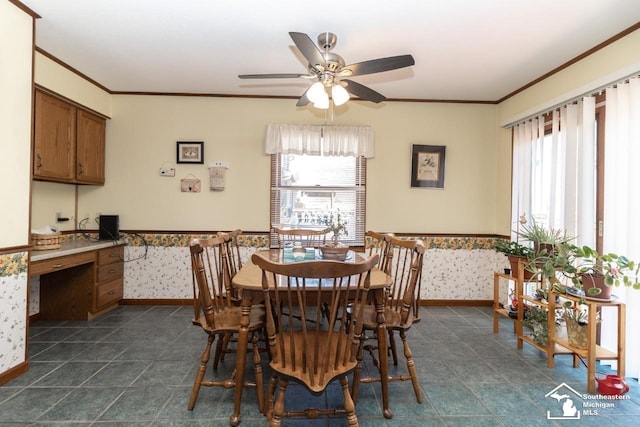 dining area featuring wallpapered walls, plenty of natural light, and ceiling fan