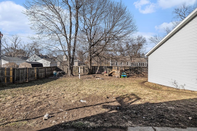 view of yard with a fenced backyard