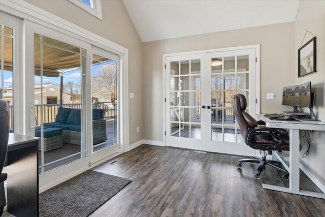 office space featuring french doors, lofted ceiling, baseboards, and wood finished floors