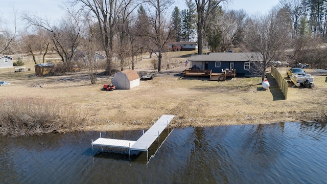 dock area featuring a deck with water view