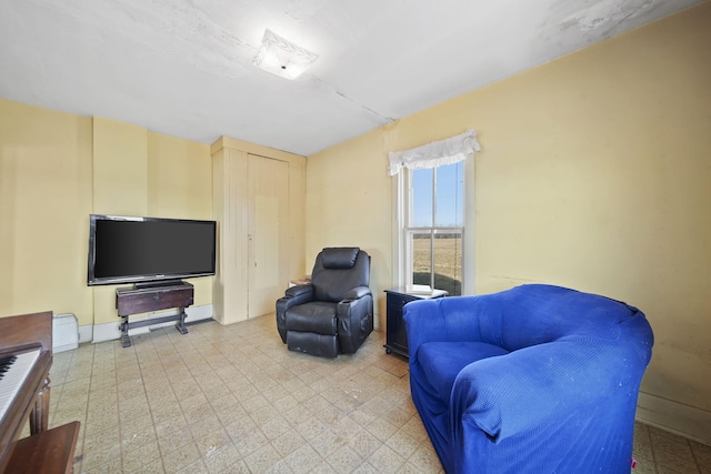 sitting room featuring tile patterned floors