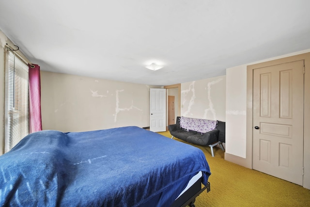 bedroom with light colored carpet