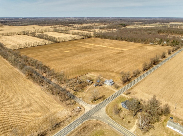 birds eye view of property featuring a rural view