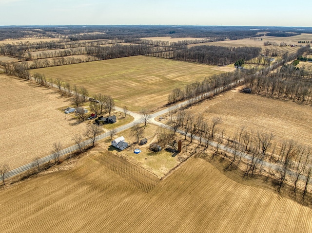 birds eye view of property featuring a rural view