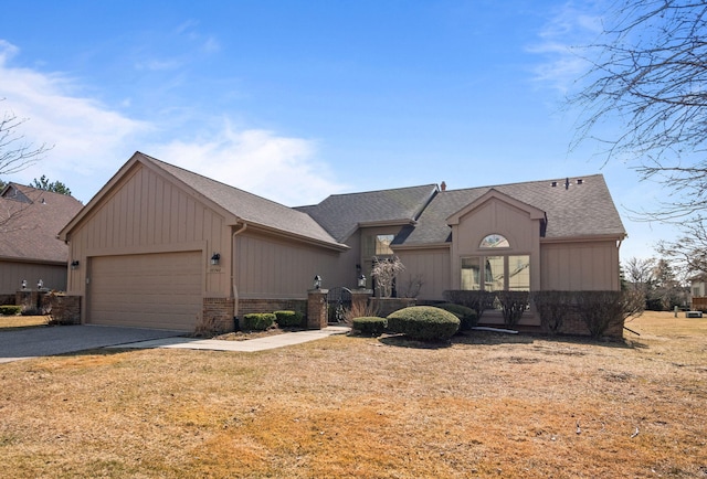 view of front facade featuring brick siding, concrete driveway, a garage, and roof with shingles