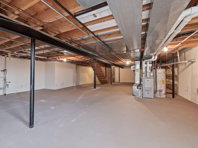 unfinished below grade area with stairway, heating unit, and water heater