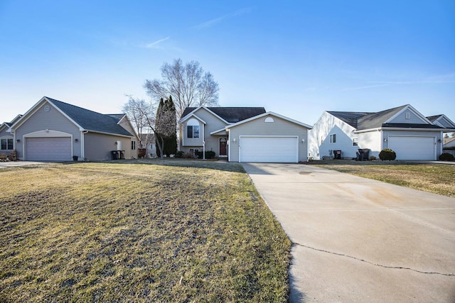 single story home with a garage, concrete driveway, and a front yard