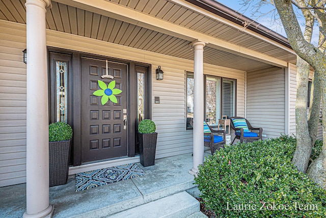 property entrance with covered porch