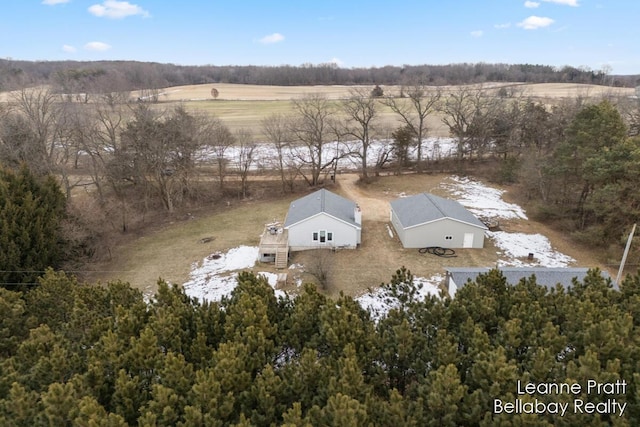 aerial view with a view of trees and a rural view