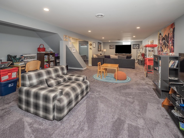 living area with visible vents, recessed lighting, stairs, and carpet floors