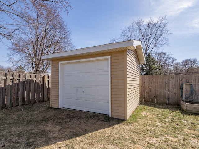 garage with fence