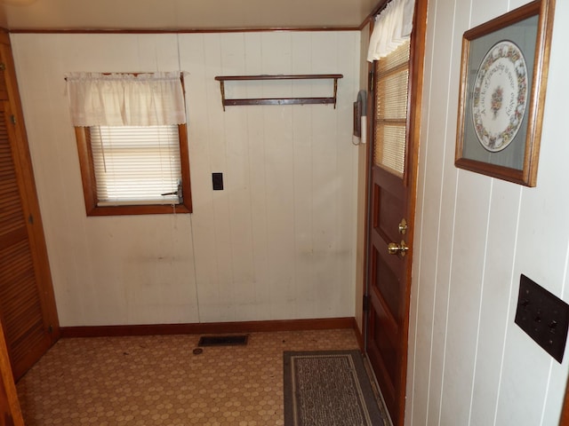 interior space with visible vents and baseboards