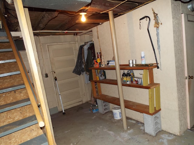 unfinished basement with stairs