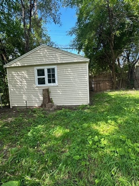 18635 Dale St, Detroit, MI 48219 - view of home's exterior with a yard and fence