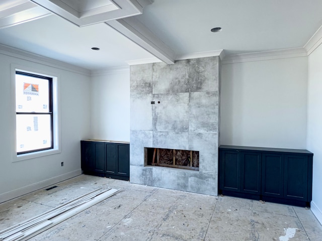unfurnished living room featuring ornamental molding, a tile fireplace, and baseboards