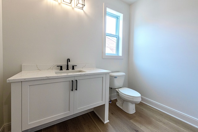 4107 Devon, Royal Oak, MI 48073 - bathroom with toilet, vanity, wood finished floors, and baseboards