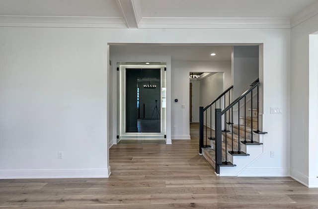 4107 Devon, Royal Oak, MI 48073 - entrance foyer featuring wood finished floors, baseboards, stairs, recessed lighting, and ornamental molding
