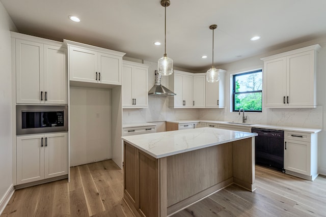 4107 Devon, Royal Oak, MI 48073 - kitchen featuring dishwasher, built in microwave, light wood finished floors, a center island, and backsplash
