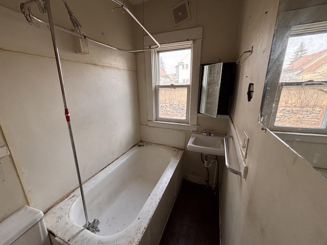 full bath with a bath, visible vents, and walk in shower