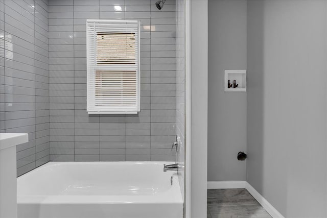 bathroom featuring baseboards