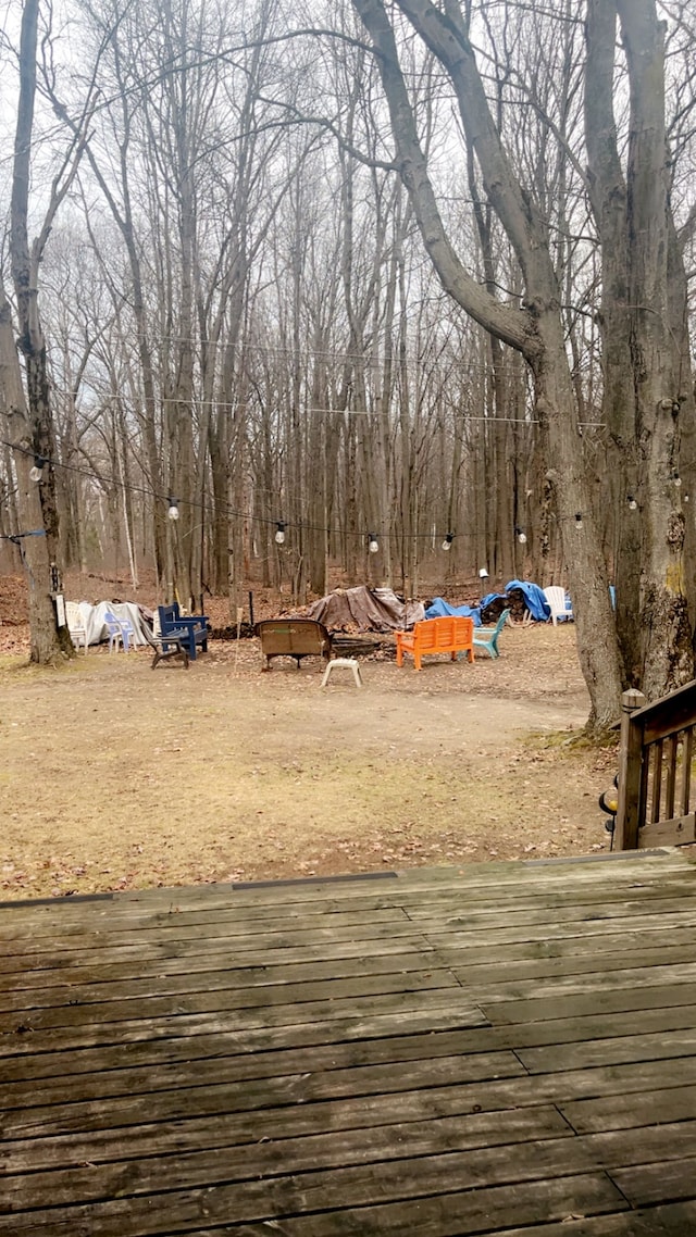 view of yard featuring a wooden deck