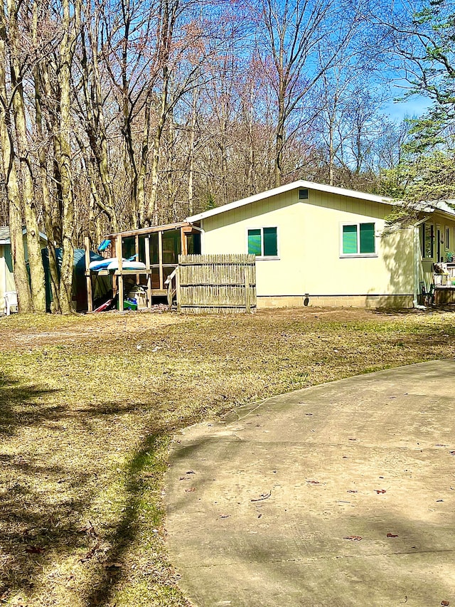 view of front of house with fence