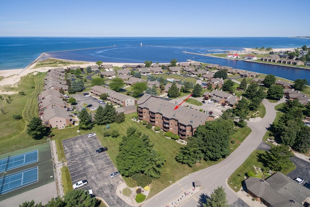 aerial view with a water view and a residential view