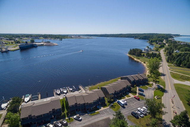 drone / aerial view with a water view