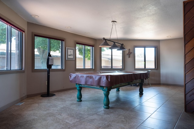 playroom with billiards, baseboards, and a textured ceiling