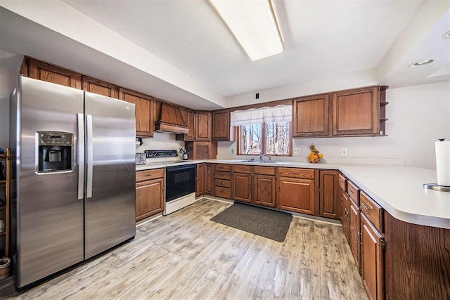 kitchen with light wood finished floors, open shelves, stainless steel fridge with ice dispenser, light countertops, and electric stove