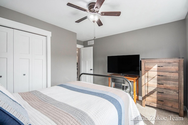 bedroom featuring visible vents, a closet, and ceiling fan