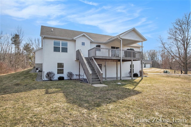 back of house with a patio area, a lawn, a wooden deck, and stairs