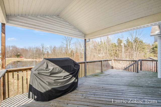 wooden deck featuring area for grilling