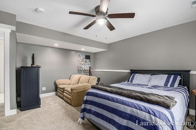 bedroom with visible vents, baseboards, a ceiling fan, and carpet flooring