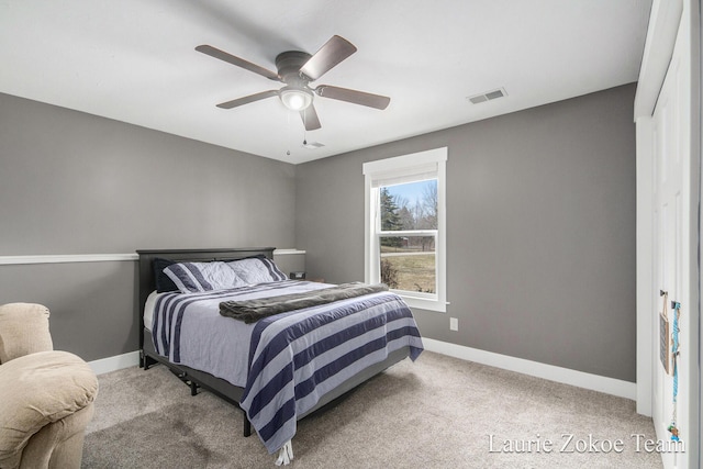 bedroom featuring visible vents, baseboards, and carpet floors