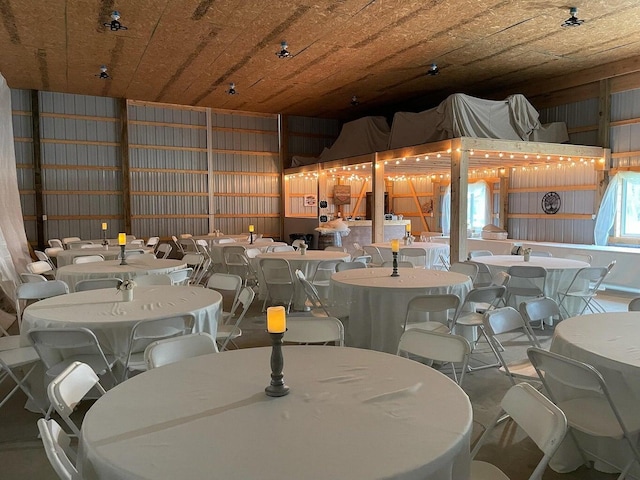 dining area with metal wall